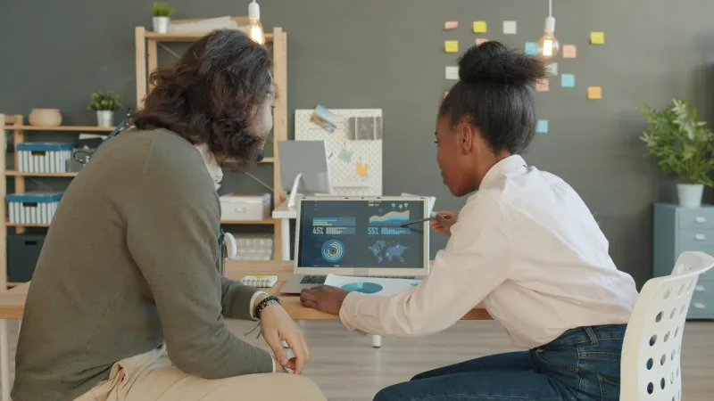 Marketing team at headquarters reviewing content performance