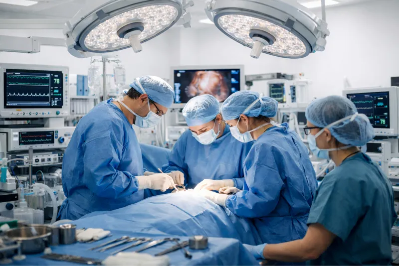 Clinical specialist delivering training in an operating room